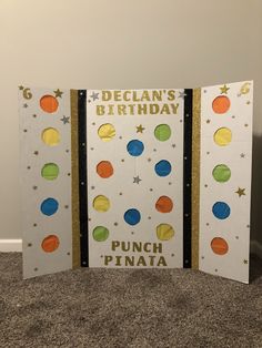 two birthday cards made to look like they have planets on them and stars in the middle