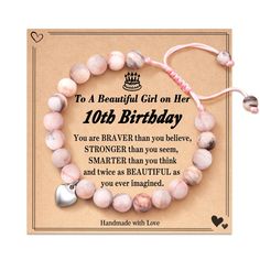 a pink bracelet with a heart charm on it that says, to a beautiful girl on her 10th birthday