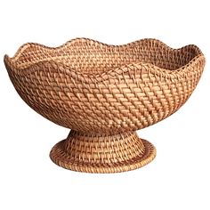 a wicker bowl is shown on a white background