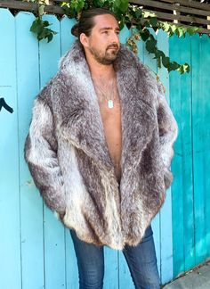 If you looking to keep warm this winter and need a casual but sharp looking fur, this is it. It doesn't get much better. This fashioned faux jacket will turn heads when walking up the streets. ML SIZE, 💯 handmade in California Fall Faux Fur Coat With Faux Fur Trim, Fluffy Faux Fur Coat For Winter, Fluffy Faux Fur Winter Coat, Winter Fluffy Faux Fur Coat, Winter Faux Fur Coat With Faux Fur Lining, Fluffy Fur Coat For Cold Weather In Fall, Long Sleeve Faux Fur Mink Coat, Mink-colored Faux Fur Coat, Steampunk Outfits