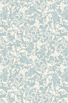 a blue and white wallpaper with swirls on it