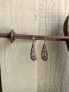 Lovely sterling silver filigree teardrop dangle earrings. Mark:  The ear wires are marked 925 too SUCH 925 (sterling silver)  My sterling and silver items are all with the original patina as when I acquired them. I leave the polishing up to the buyer. *Please visit my shop to find other great vintage items. https://www.etsy.com/shop/SionainnRiverVintage A picture is worth 1000 words. I work very hard to provide you with accurate, detailed pictures of the items that I am selling. Please look at t Handmade Silver Ornate Teardrop Earrings, Elegant Sterling Silver Filigree Teardrop Earrings, Sterling Silver Filigree Teardrop Earrings, Artisan Dangle Filigree Earrings, Ornate Silver Nickel-free Teardrop Earrings, Silver Items, Detailed Pictures, Woodland Hills, Teardrop Dangle Earrings