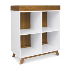 a white and brown bookcase with three shelves