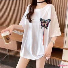 Qteee - Elegantly Embroidered Round Collar T-Shirt with Butterfly Design Casual Embroidered Crew Neck Top, White Floral Embroidered Short Sleeve Top, White Floral Embroidery Short Sleeve Top, Casual Cotton Tops With Floral Embroidery, Casual Cotton Embroidered Shirt, Casual Embroidered Cotton Shirt, White Crew Neck Top With Floral Embroidery, White Floral Embroidered T-shirt, White Floral Embroidered Short Sleeve T-shirt