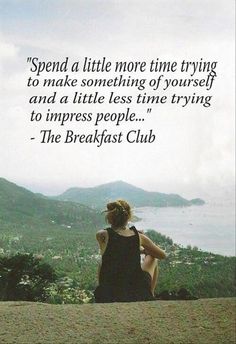 a woman sitting on top of a hill next to the ocean with a quote above her that reads, spend a little more time trying to make something of yourself and a little less time trying