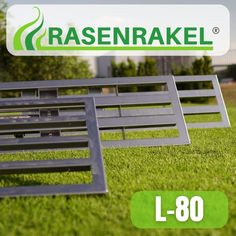 several benches sitting in the grass near each other with an advertisement for basenerokel