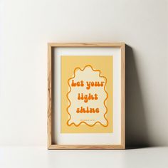 an orange and yellow print with the words, but your light shines on it