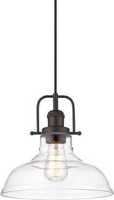 a large glass light fixture hanging from a metal ceiling fixture with an industrial style finish