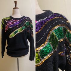 "Vintage 1980's Black Sequin Sweater Inner Size tag; Small; Oversized Fit Brand on Tag: Marnie West Era: 1980's Inner Content Tag; 80% Silk, 10% Nylon, 9% Angora Rabbit Hair, 1% Lambswool Hand Wash Super Soft Silk & Wool Blend Abstract Sequin Patterns Across Chest in Pink, Purple, Gold & Green Colors Shoulder Pads that could easily become removed Good Vintage Condition. No Holes, Tears or Stains, Pilling As shown in Images Measurements: Bust: 19\" from armpit to armpit, laying flat. Waist: 19\", laying flat Hem: 17\", laying flat, 24\" Laying Flat Front Length: 29\" from shoulder to bottom hem. Shoulder Width: 19\"  Arm Length: 25\" from collar to cuff **Check measurements to ensure a good fit**" Angora Rabbit, Summer Work Outfits, Sequin Sweater, Silk Wool, Pullover Sweater Women, Spring Summer Outfits, Black Sequins, Women Pullover, Purple Gold