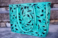 Handmade Turquoise Floral Tote, 100% Leather Bag, Everyday Handbag, Womens Western Purse, Tooled cowgirl, gift for her, handcrafted satchel by VirginiaHandbags on Etsy https://www.etsy.com/listing/627917879/handmade-turquoise-floral-tote-100 Western Hand Tooled Bags For Daily Use, Western Hand-tooled Bag For Daily Use, Western Style Hand-tooled Bag For Daily Use, Hand Tooled Turquoise Bag For Everyday Use, Turquoise Hand Tooled Bags For Everyday Use, Turquoise Hand Tooled Rectangular Shoulder Bag, Turquoise Hand Tooled Everyday Bags, Turquoise Hand Tooled Travel Bag, Hand Tooled Turquoise Shoulder Bag For Everyday Use