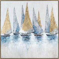 a group of sailboats floating in the ocean