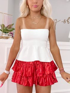 Hidden Angel White Strapless Top | Sassy Shortcake | sassyshortcake.com White Ruffled Strapless Tube Top, White Strapless Tube Top With Ruffles, White Strapless Ruffled Tube Top, White Flirty Strapless Top, White Strapless Flirty Top, Flirty White Strapless Top, White Ruffle Hem Top For Party, White Top With Ruffle Hem For Party, White Party Top With Ruffle Hem