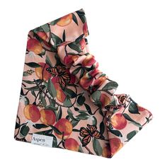 an orange and pink floral print pocket square with a butterfly on the front, sitting against a white background