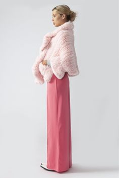 This sumptuously soft knitted faux fur cape will keep you toasty and trendy throughout the wintry months. Whether you dress it up with sequins and or a gown or keep it casual with your favourite skinny trousers this wrap will add nothing but compliments to your day.  Faux fur cape wrap with hook and eye fastening and pockets.    One size    Comfortably fits sizes 8 - 14 UK