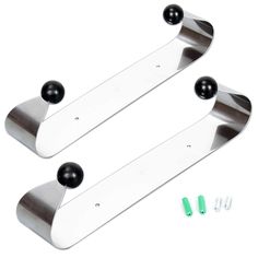 two metal brackets with black balls on them