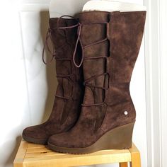 Stylish & Warm Ugg Size 11 Chocolate Brown Wedge Boots, The Elsey. New With Tags, Only Tried On In Store. The Tags Have Worn Off A Bit From Folks Trying Them On In The Store & Sitting In My Closet. They Have Never Been Worn Outside Of Nordstrom Rack. Size 11, 3.25 Inch Wedge With Approximately 0.5 Inch Height In Toes. Inside Front Of The Boot Is Lined With Shearling Down To Ankle. The Internal Back Is Lined With Leather. The Insole Is Lined With Soft & Warm Shearling. The Wedges Have A Slight Da Ugg Boots With Bows, 2000s Fall, Brown Wedge Boots, Ugg Ankle Boots, Lace Up Heel Boots, Black Peep Toe Heels, Pretty Halloween, Winter Leather Boots, Black High Heel Boots