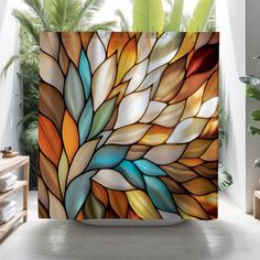 a bathroom with a large stained glass shower curtain in the shape of a leafy tree