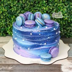 a cake decorated with blue and purple icing