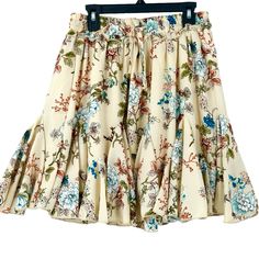 Sinplee Women’s Expandable Waist Floral Mini Skirt Cream Size L Elevate Your Style With This Stunning Simplee Women's Expandable Waist Floral Mini Skirt In Cream, Size L. The Skirt Features A Beautiful Floral Pattern And Pull-On Closure For Ease Of Wear. It Is Made Of A High-Quality Blend Of Polyester And Cotton, Ensuring Both Comfort And Durability. This Skirt Is Perfect For Any Occasion, Dress It Up With Heels Or Dress It Down With Sandals. It Is A Regular Fit And Has A Short Length That Is Pe Beige Floral Print Skirt For Vacation, Flowy Casual Mini Skirt, Spring Beige Mini Skirt With Elastic Waistband, Beige Mini Skirt With Elastic Waistband For Spring, Spring Bohemian Short Mini Skirt, Cottagecore Shorts, Brown Floral Skirt, Floral Mini Skirt, Brown Floral