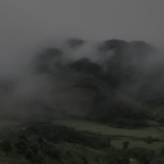 fog rolling in on the hills and trees