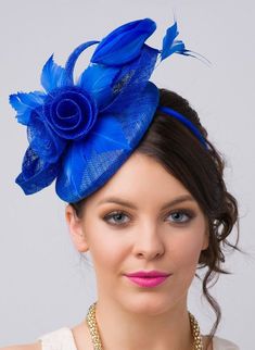 "\"Emelia Rose\" Royal Blue Fascinator This vintage-inspired fascinator is as timeless as a fairytale. Let your personality add life to its floral center and ribbon loop accents. It's round base and slip-on headband will allow you to look flawless and enjoy any event with ease! - Easy wear headband - Round sinamay base Add Men's Matching Bow Tie: Don't you dare get caught mismatching your sweetie's favorite fascinator! Pippa & Pearl now carries bow ties so you and your partner will look like Blue Adjustable Headband Costume Hat, Adjustable Blue Headband Costume Hat, Adjustable Blue Costume Headband, Blue Handmade Flowers Fascinator For Races, Elegant Blue Fascinator With Handmade Flowers, Blue Adjustable Headband Fascinator, Adjustable Blue Headband Fascinator, Adjustable Blue Headband For Kentucky Derby, Adjustable Fascinator For Royal Ascot Vintage Events