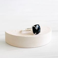 Classic and wearable, this stunning ring will definitely make a statement. Also available in other gemstones GEMSTONE: Onyx STONE SIZE: 12mm x 12mm RING SIZE: Adjustable MATERIAL: gold/silver plated brass Minimalist Adjustable Faceted Rings, Minimalist Open Ring Crystal Gemstone Ring, Minimalist Open Crystal Ring With Gemstone, Minimalist Crystal Open Ring With Gemstone, Minimalist Large Stone Ring For Anniversary, Onyx Gemstone Open Ring, Minimalist Gemstone Dome Ring As Gift, Minimalist Gemstone Dome Ring Gift, Minimalist Onyx Gemstone Ring