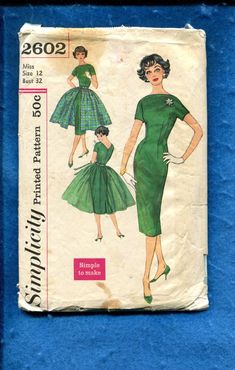 a vintage sewing pattern for a dress with short sleeves and collared neckline, from the 1950's