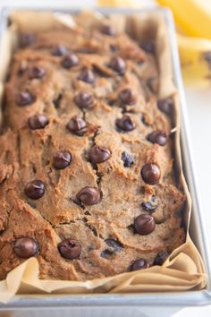 a loaf of chocolate chip banana bread in a pan