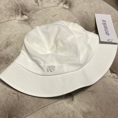 Brand-New Marika White Bucket Hat, One Size Fits Most, Brand New With Tags. This Has Upf 25 Protection From The Sun, Designed For Any Outdoor Activities. Keeps You Nice And Cool Yet Covered. White Bucket Hat, Running Hats, Outdoor Activities, New Color, Bucket Hat, Accessories Hats, The Sun, Color White, Women Accessories