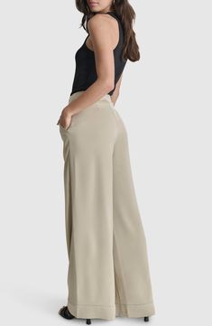 Effortlessly elevate your on-the-clock style with these streamlined wide-leg pants. Zip fly with hook-and-bar closure Front slant pockets 100% polyester Dry clean or machine wash, tumble dry Imported Formal Wide-leg Pants With 4-way Stretch, Loose Fit Wide Leg Dress Pants, Versatile Wide Leg Business Casual Pants, Versatile Business Casual Wide Leg Pants, Versatile Wide Leg Pants For Business Casual, 4-way Stretch Wide Leg Work Pants, 4-way Stretch Wide Leg Pants For Work, Wide-leg Dress Pants With 4-way Stretch For Work, 4-way Stretch Wide Leg Pants With Pockets For Work