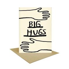 a card with the words big hugs written in black ink on it, and a hand holding