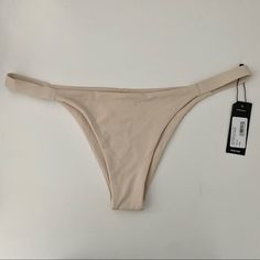 Tavik Swimwear Heather Bottom In Tapioca Cream Colored Super High Quality Swimwear Brand New In Perfect Condition, Never Worn, Still Has Sanitary Liner Size Large Brand Also Sold By Free People, Nordstrom, Madewell, Revolve, Asos, And Anthropologie Beige Lined Swimwear For Beach Season, Beige Lined Swimwear For Summer, Beige Lined Swimwear, Chic Beige Stretch Swimwear, Beige Swimwear For Sunbathing, Beige Lined Swimwear For Spring, Chic Beige Lined Swimwear, Spring Beige Lined Swimwear, Beige Lined Swimwear For The Beach