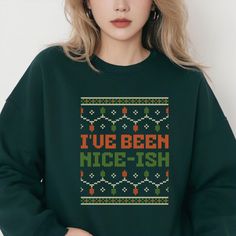 This funny winter ugly Christmas sweater sweatshirt is the perfect funny holiday gift. "I've been nice-ish" About - Classic fit unisex crewneck sweatshirt - Comfortable and cozy medium-heavy blend fabric with ribbed knit collar - Tear-away label - Fabric blends: 50% cotton and 50% polyester - Made with 100% ethically grown US cotton How to Order 1. Select your sweatshirt size from the dropdown menu. (Please review size chart in photos) 2. Select your sweatshirt color from the dropdown menu. (Col Funny Winter Sweatshirt With Letter Print, Funny Winter Top With Text, Funny Graphic Print Sweatshirt For Winter, Winter Funny Style Top With Text, Winter Funny Text Top, Funny Print Winter Sweatshirt, Funny Long Sleeve Winter Sweatshirt, Funny Print Sweatshirt For Winter, Funny Crew Neck T-shirt For Winter