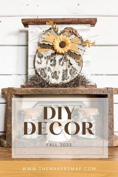 a sign that says diy decor fall 2013 on top of a wooden box with sunflowers