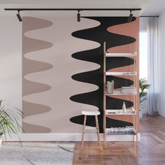 an abstract wall mural with black, pink and white waves on it's side