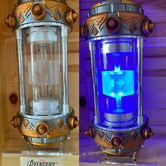 two different views of an old fashioned light fixture with blue and yellow lights on it