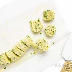 some food is laying out on a cutting board and ready to be cut into pieces