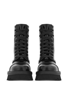 Find SALVATORE FERRAGAMO Chunky-sole Combat Boots on Editorialist. black calf leather round toe front lace-up fastening ankle-length ridged rubber sole Edgy Leather Lace-up Boots With Lug Sole, Streetwear Combat Boots With Lace-up Fastening And Round Toe, Streetwear Combat Boots With Front Lace-up And Round Toe, Leather Platform Lace-up Boots For Streetwear, High-top Platform Boots With Leather Sole For Work, Edgy Platform Boots With Lug Sole And Flat Heel, Edgy Platform Boots With Lug Sole, Edgy Lace-up Round Toe Work Boots, Edgy Round Toe Lace-up Boots For Workwear