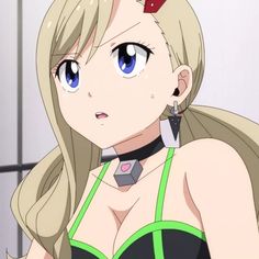 a woman with blonde hair and blue eyes wearing a green bra top is looking at the camera