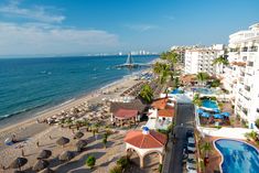 an aerial view of the beach and ocean