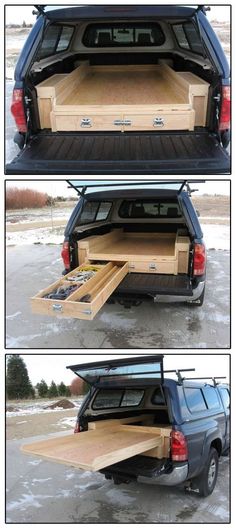 the back end of a pickup truck with an open hatchback and wooden trays