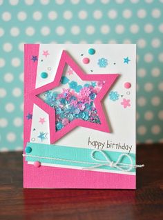 a birthday card with a pink star on it