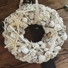 a wreath made out of shells and seashells