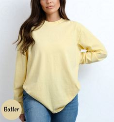 Blank Comfort Color Long Sleeve Shirt Unisex Long Sleeve Top Wholesale Clothing Blank Shirt Long Tshirt Boho Long Sleeve Women Long Shirt ✨ PRODUCT DESCRIPTION ✨ ∘ ∘ For an Oversized look, consider sizing up 1-2 above your normal size. ∘ ∘ UNISEX TSHIRT ∘ Relaxed fit ∘ Medium fabric ∘ 100% Preshrunk Cotton ∘ Garment-dyed fabric ∘ Double-needle topstitch seams for long-lasting ∘ ∘ Design colors may differ slightly from the final printed item due to the printing process and monitor calibration. ∘ ∘  📏 SIZE 📏 ∘ Adult Unisex sizing. We have a size chart on our listing photos ↑. ⏱️ SHIPPING & PRODUCTION TIME ⏱️ ∘ Please allow 1-5 business days for processing time. ∘ Shipping time is 3-5 business days. ✨ CARE INSTRUCTIONS ✨ ∘ Inside out, wash cold with a delicate cycle ∘ Hang Dry ∘ Do not use Yellow Long Sleeve T-shirt For Spring, Basic Oversized Long Sleeve Tops, Oversized Long Sleeve Basic Tops, Plain Yellow Top For Spring, Basic Long Sleeve Plain Shirt, Plain Long Sleeve Relaxed Fit Top, Basic Oversized Long Sleeve Shirt, Oversized Yellow Long Sleeve Top, Cotton Tops With Shirttail Hem For Fall