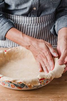 an image of a pie crust being made with the title text overlay reads little spoon farm how to make sourdough pie crust