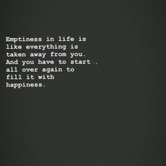 a black and white photo with the words happiness written on it, in front of a dark background