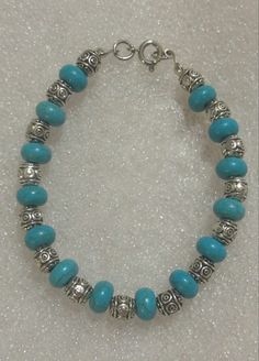 Turquoise beads with antique silver beads Bohemian Turquoise Beaded Bracelets With Silver Beads, Bohemian Turquoise Beaded Bracelet With Silver Beads, Bohemian Silver Beaded Bracelets With Large Beads, Turquoise Beaded Bracelets With Silver Beads, Spiritual Nickel-free Turquoise Beaded Bracelets, Southwestern Silver Beaded Bracelets With Round Beads, Bohemian Turquoise Beads With Silver Details, Turquoise Beads With Silver Beads For Jewelry Making, Turquoise Oval Beaded Bracelets