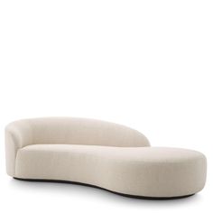 an oval shaped couch with black legs