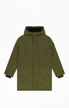 Conquer the cold with the WeSC Winter Parka, a heavyweight jacket designed to keep you warm and stylish through the harshest winter weather. Combining practical features with a sleek design, this parka is your ultimate winter essential.Heavyweight Winter Parka with Hood: Built for ultimate warmth and protection in freezing temperatures.Sherpa Lined: Plush Sherpa lining offers extra coziness and insulation.Adjustable Hood with Bungee Drawcord: Customize the fit to block out wind and snow.Fleece Lined Welt Chest Pockets: Provides warm, secure storage for your essentials.Fleece Lined Cargo Pockets at Waist: Extra warmth and practicality for carrying your gear.Vegan Logo Silicone Patch: Eco-friendly detailing that highlights your commitment to sustainable fashion.Signature WeSC Exterior Label: Military Style Waterproof Outerwear For Outdoor Activities, Functional Khaki Parka For Outdoor Work, Khaki Techwear Outerwear For Cold Weather, Functional Windproof Khaki Outerwear, Hooded Parka For Outdoor Winter Work, Functional Khaki Windproof Parka, Urban Winter Parka With Fleece Lining, Winter Hooded Jacket For Outdoor Work With Detachable Hood, Winter Hooded Jacket With Detachable Hood For Outdoor Work