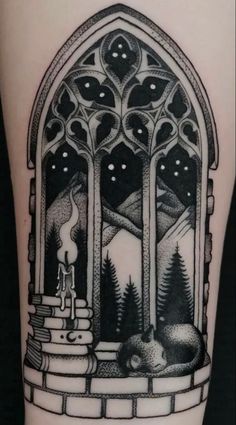 a black and white tattoo with an image of a forest, fire hydrant and mountains